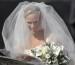 Radiant bride Zara Phillips beams as she makes her way into the church to marry Mike Tindall 25